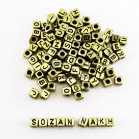 مهره پلاستیکی مکعب الفبا طلایی سایز 6