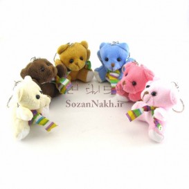 عروسک خرس نشسته با شال گردن راه راهی